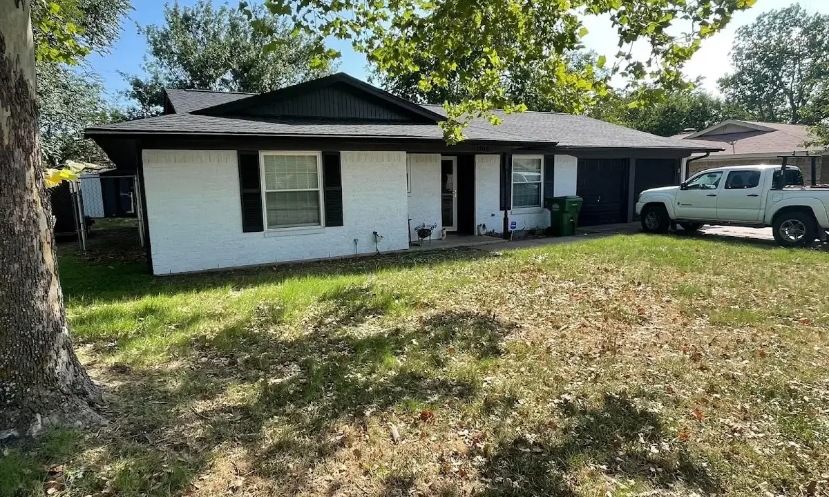 Professional roofing crew working on a residential roof in Fussels Corner